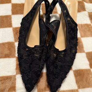 Black rose slip on low heal shoes